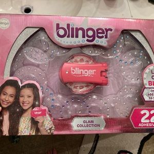 Blinger adhesive gems for hair.